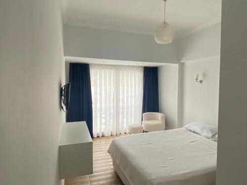Postel nebo postele na pokoji v ubytování Bouvardia Inn
