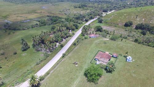 an aerial view of a road in a field at Fazenda Santo Antônio in Antônio Cipriano