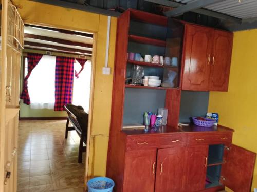 Photo de la galerie de l'établissement Koipoi Cottage, à Kimana