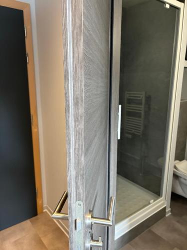 Ένα μπάνιο στο Appartement ESCURIAL CHU VANDOEUVRE-LES-NANCY