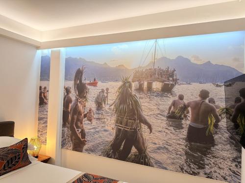 a painting of a group of people in the water at Ononui Airport Studio in Faaa