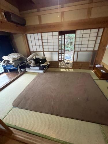 Kép guesthouse 古民家の宿屋千鶴1階1号室部屋貸し szállásáról Hirosimában a galériában