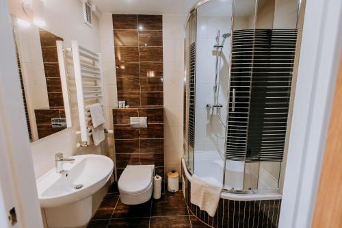Kúpeľňa v ubytovaní Apartament Milbertus