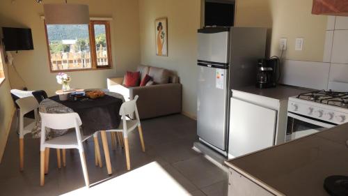 Küche/Küchenzeile in der Unterkunft Casa con magnifica vista al Cerro Catedral