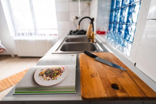 a plate of food on a counter in a kitchen at The Vardo: Elegant Villa in Predelut in Bran
