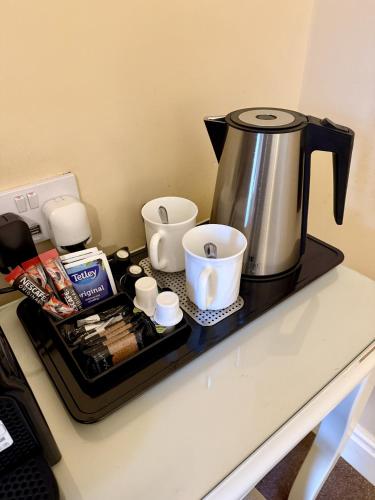 a coffee maker on a tray on a counter at The Crescent York in York