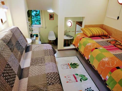 Ένα ή περισσότερα κρεβάτια σε δωμάτιο στο Student Home