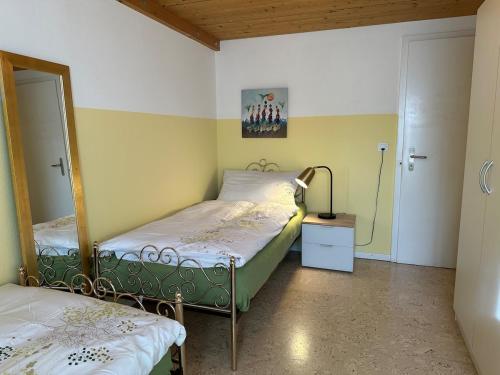 Postel nebo postele na pokoji v ubytování Hadassa