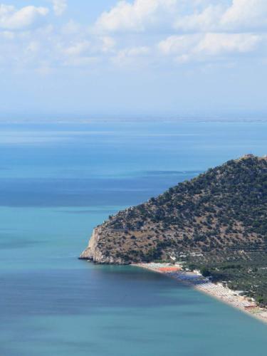 an island in the middle of a body of water at B&B I Due Orizzonti in Mattinata