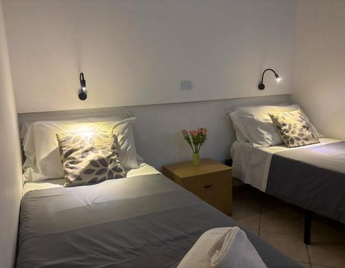 Katil atau katil-katil dalam bilik di Case Vacanze Mare Nostrum - Villas in front of the Beach with Pool