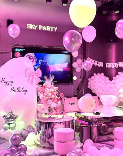 TV a/nebo společenská místnost v ubytování 龙湖高新天街店Loft房