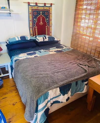 a bedroom with a bed in a room at OUPAs se Plek in Kontiki