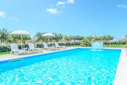 Kolam renang di atau dekat dengan Case Vacanze Mare Nostrum - Villas in front of the Beach with Pool