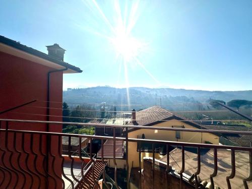 a view of the sun from the balcony of a house at Casa Vacanze Zia Flora in Avellino