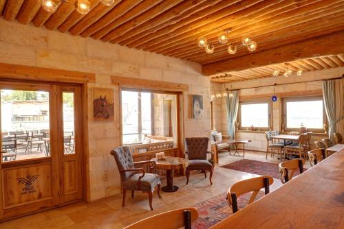 Un restaurante u otro lugar para comer en Vasıl Cave Hotel