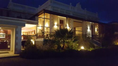 a building at night with lights on it at Montecassino in Capilla del Monte