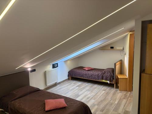 Postel nebo postele na pokoji v ubytování Fedrig Hostel rooms