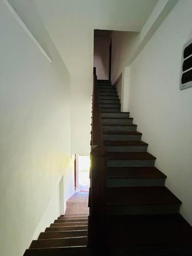 a stairway in a building with a stair case at Villa LA Kurumba in Ambalangoda