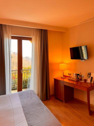 Katil atau katil-katil dalam bilik di Hotel Resort & Spa Miramonti