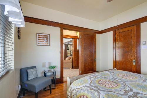 a bedroom with a bed and a chair at Red Rock Rentals in Cannonville