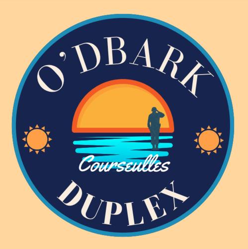 a blue circle with a man standing on a surfboard in the ocean at "O'Dbark" - duplex 2 étoiles - à 100m de la plage avec jardin in Courseulles-sur-Mer