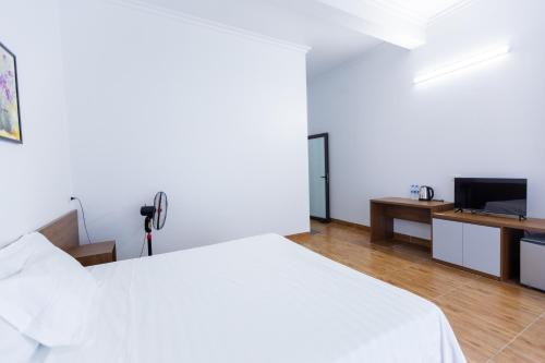 Postel nebo postele na pokoji v ubytování Tam Cốc Newway Homestay