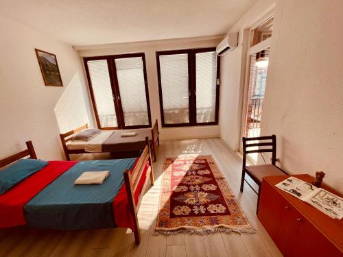 Postel nebo postele na pokoji v ubytování Rooms - near bus station