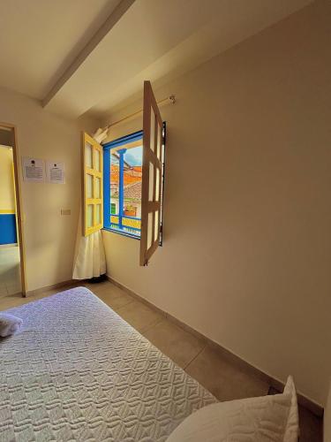 Katil atau katil-katil dalam bilik di Hotel Dorado Jardín