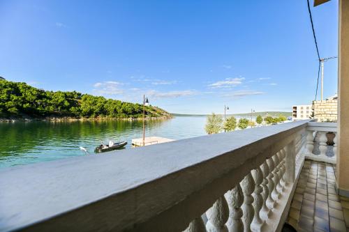 a view of a river with a boat in the water at Apartment Bazdaric in Novigrad Dalmatia