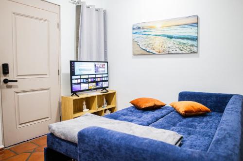 Una televisión o centro de entretenimiento en Depas WAICURA'S