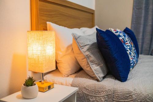 Una cama o camas en una habitación de Depas WAICURA'S