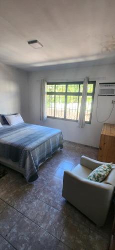 Cama ou camas em um quarto em Jeremias Hostel Bar