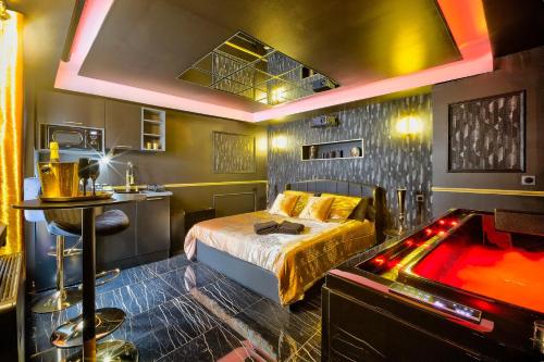 LA GOLDEN ROOM - Suite de Luxe avec Jacuzzi