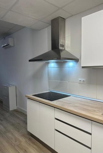 Η κουζίνα ή μικρή κουζίνα στο Apartamento Valencia 17
