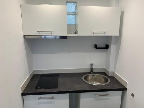 Køkken eller tekøkken på Appartement idéale proche Paris