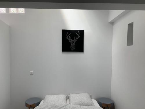 En eller flere senge i et værelse på Appartement idéale proche Paris