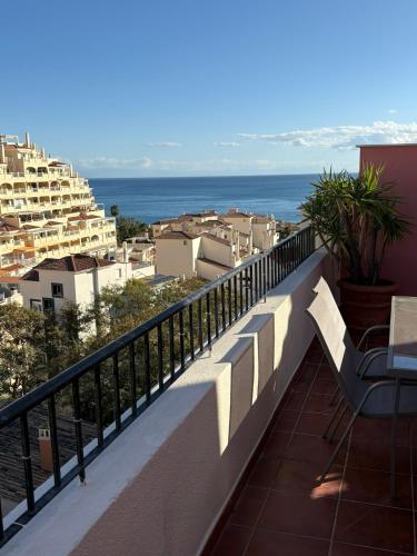 a balcony with a view of the ocean at El Ático de Brisaquebrada - Vista Mar - Gran Terraza in Benalmádena