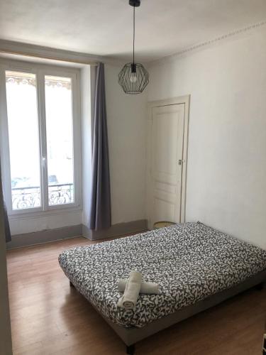 Postel nebo postele na pokoji v ubytování Rent4night Grenoble Aigle