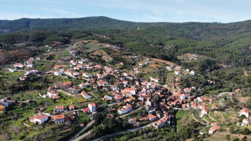 an aerial view of a small village in the mountains at Casa Iris Cunqueiros in Sobreira Formosa