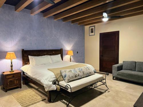 Postel nebo postele na pokoji v ubytování Macarena Guest House