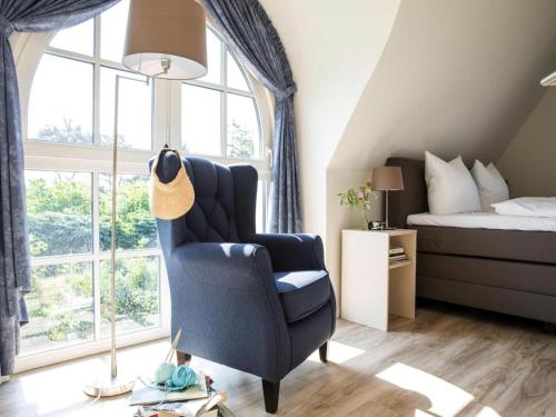 Postel nebo postele na pokoji v ubytování Luxushaus Boddenküste mit Sauna