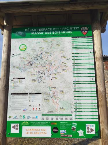 a large sign with a map of the world at L 'échappe-loups maison de 2 à 8 personnes et garage in Chapelle-Agnon
