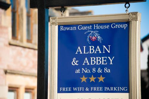 a sign for a banquet guest house group at alan and abbey at Alban and Abbey House in Inverness