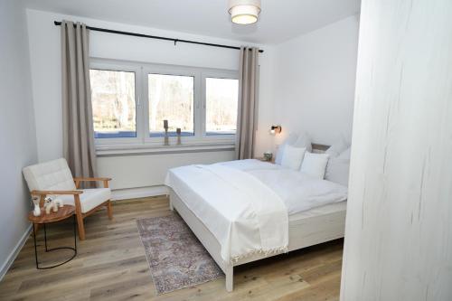 Postel nebo postele na pokoji v ubytování Ferienwohnung Forellenhof - Mitten in der Natur