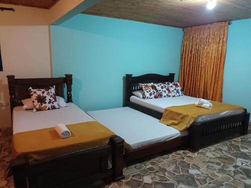 Postel nebo postele na pokoji v ubytování BRISAS DEL RIO SALENTO