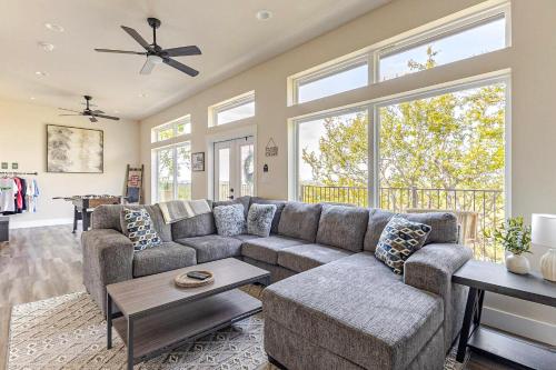 a living room with a couch and a table at The Riverscape at Gruene in New Braunfels