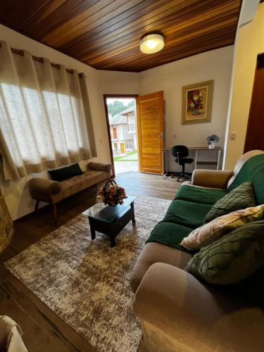 Posezení v ubytování Chalé Villagio Monte Verde