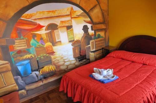 Postel nebo postele na pokoji v ubytování Hostal Florencia