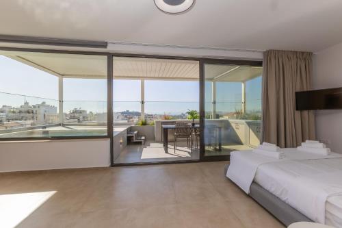Raise Pagrati Serviced Apartments