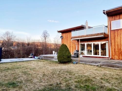 a house with a large yard in front of it at Villa Kristiania in Oslo